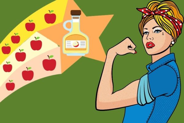 Na co pomaga ocet jabłkowy? Te 4 efekty zobaczysz u siebie, gdy włączysz go do swojej diety. kobieta pokazuje biceps w tle ocet jabłkowy i jabłka